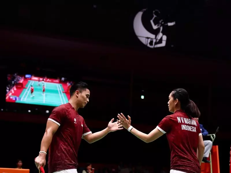 Taufik Hidayat Kuatkan Amri/Nita